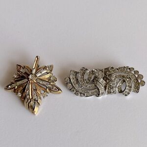 Two Trifari brooch